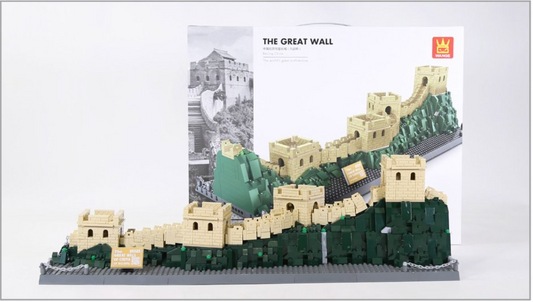 Model of the Great Wall of China made from building blocks with packaging in the background.