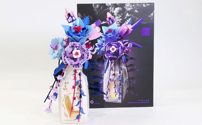Decorative floral arrangement with packaging on a white background