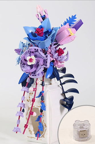 Decorative item with colorful flowers and ribbons on a white background