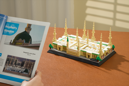 Completed Prophet's Mosque brick model displayed with instruction manual