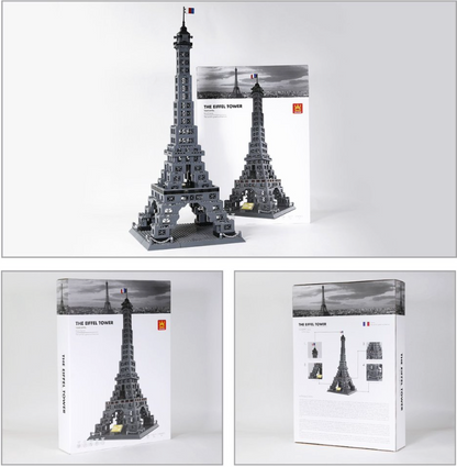 Model of the Eiffel Tower made from building blocks with packaging on a white background