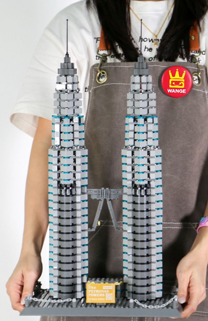 Close-up of Petronas Twin Towers brick set upper spires and geometric Islamic facade pattern