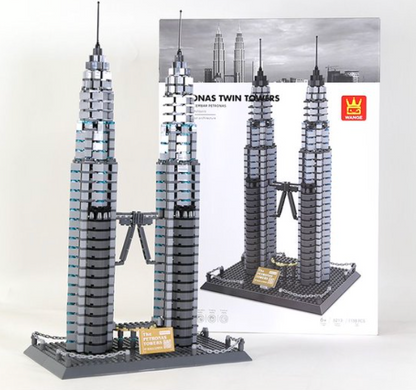 Model of Petronas Twin Towers made from building blocks with packaging in the background.