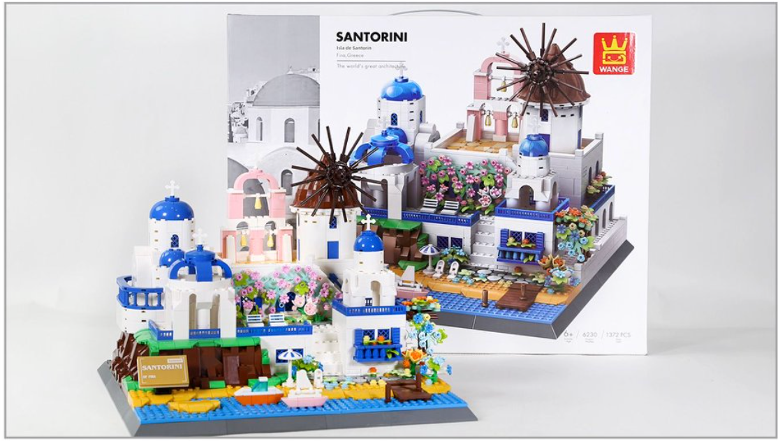 Toy building set resembling Santorini with a box labeled 'Santorini'.