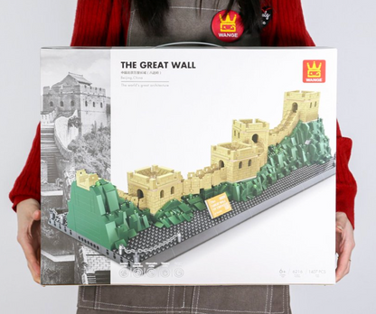Great Wall of China brick model overhead angle showing winding wall path watchtower rooftops and terrain detail
